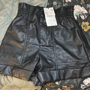 Black leather shorts